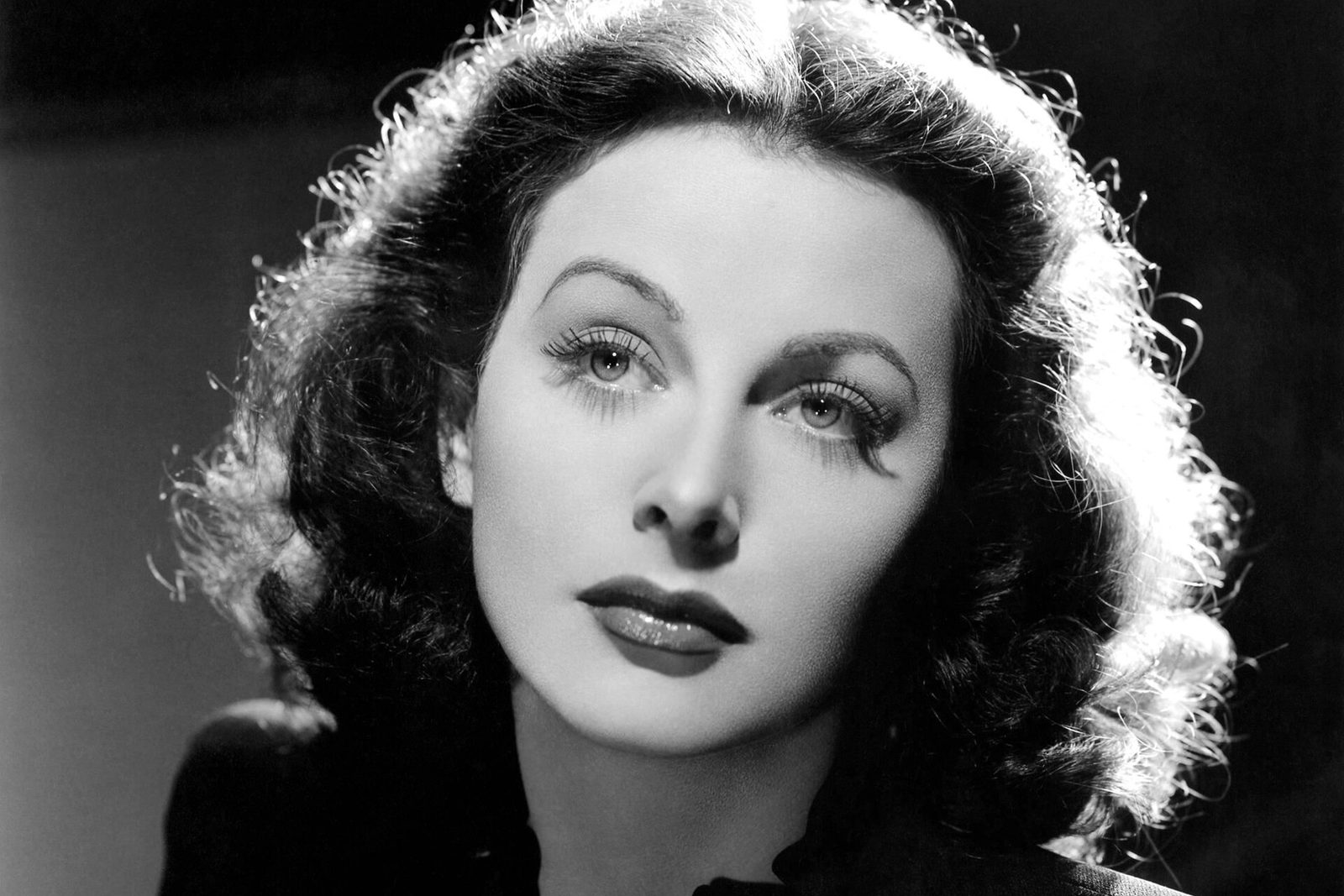 Black-and-white studio portrait of Hedy Lamarr