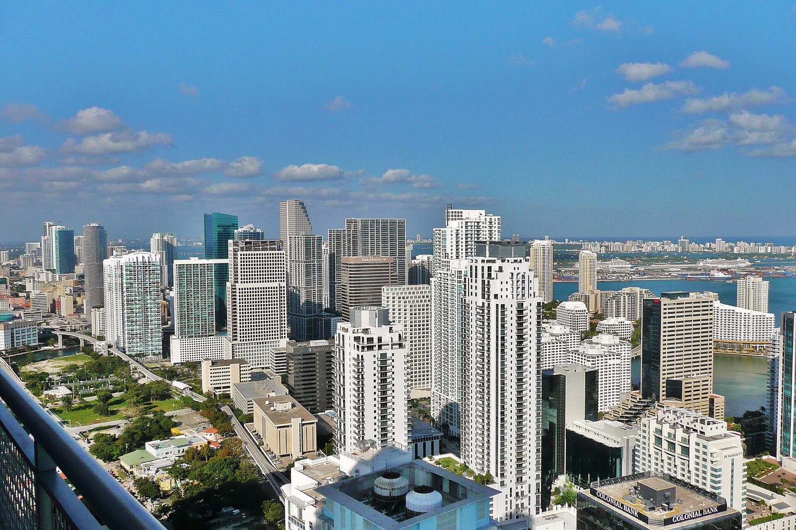 The Brickell district of Miami seen from above, condominium towers running down to the bay