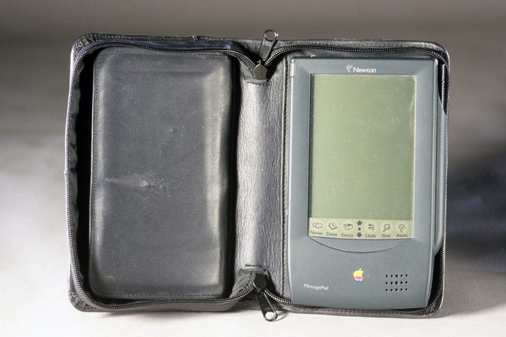 An Apple Newton MessagePad resting in its folding case